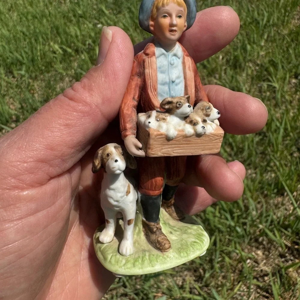 Norman Rockwell Puppy Love Figurine of Boy with Puppies
